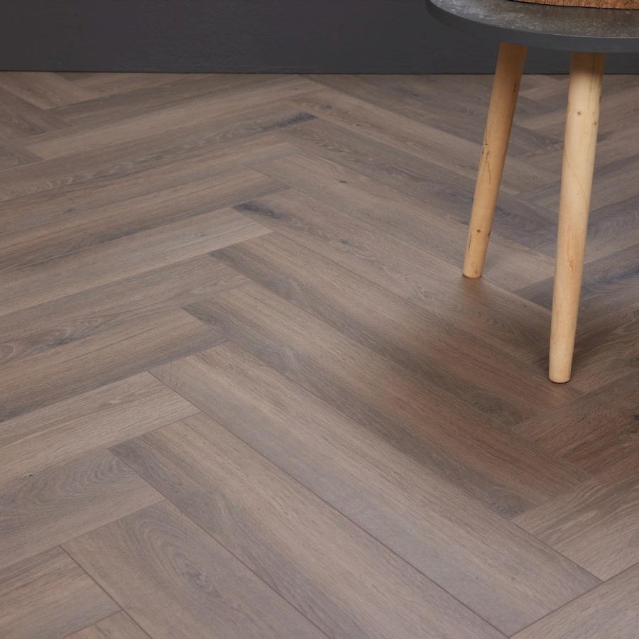 Asbruin Eiken PVC Visgraatvloer Detailfoto Asbruin Eiken PVC Visgraatvloer Detailfoto